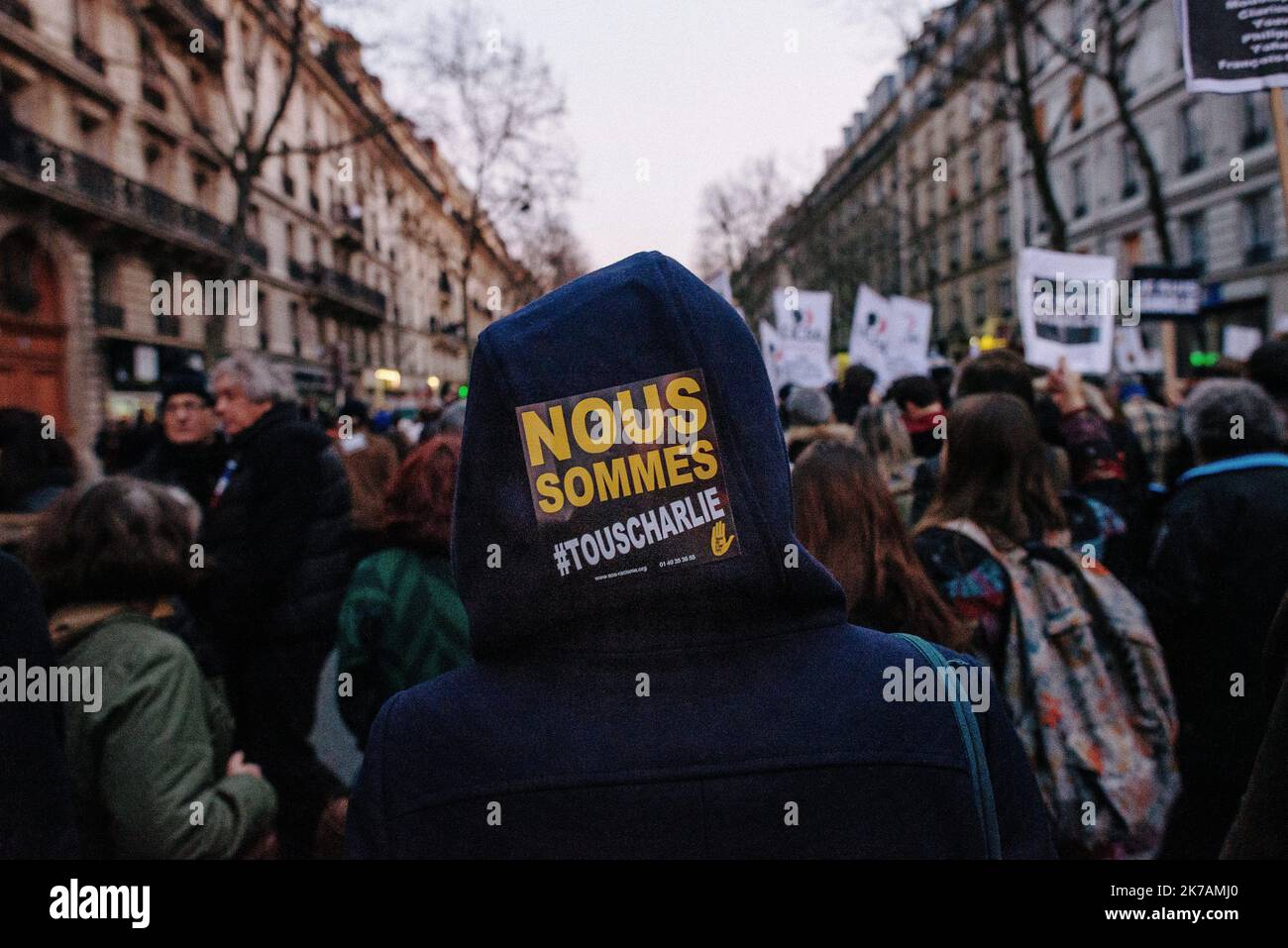 ©Jan Schmidt-Whitley/Le Pictorium/MAXPPP - Jan Schmidt-Whitley/Le Pictorium - 11/01/2015 - France / Paris - Dimanche 11 janvier 2015, une foule immense s'est reunie entre Republique et Nation pour montrer son attachement aux valeurs republicaines suite aux attentats contre Charlie Hebdo et l'Hyper Casher de la porte de Vincennes par les frere Kouachi. Ils ont revendiques l'attentat au nom de Al-Qaida dans la peninsule Arabique (AQPA). Les victimes de la tuerie sont les dessinateurs Cabu, Charb, Honore, Tignous et Wolinski, la psychanalyste Elsa Cayat, l'economiste Bernard Maris, le policier Fr Stock Photo