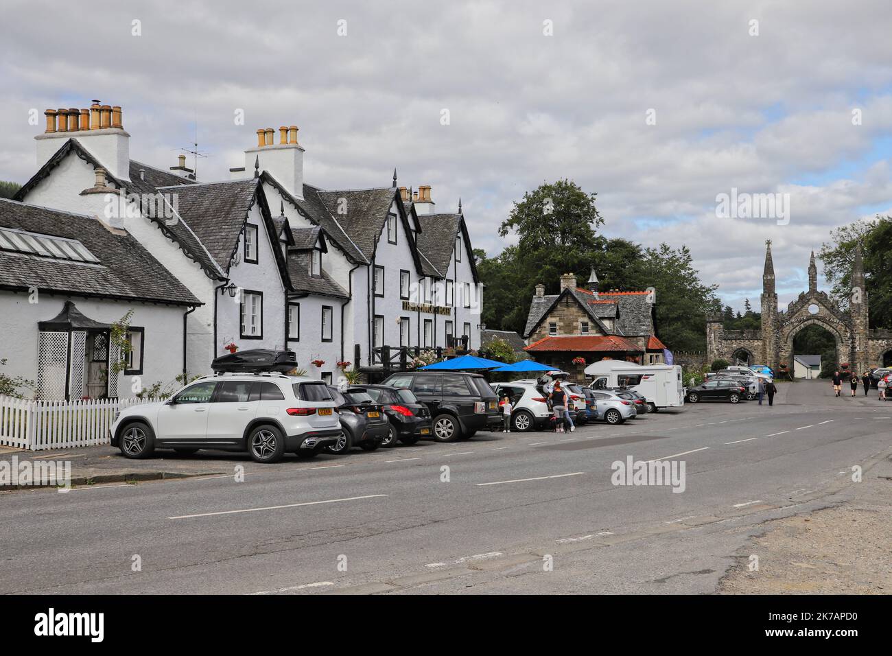 Kenmore street scene with Taymouth Estate Gateway and Kenmore Hotel Scotland August 2021 Stock