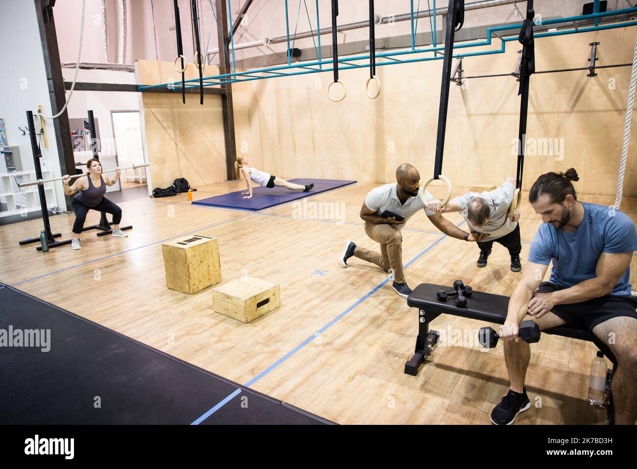 People working out in gym Stock Photo Alamy
