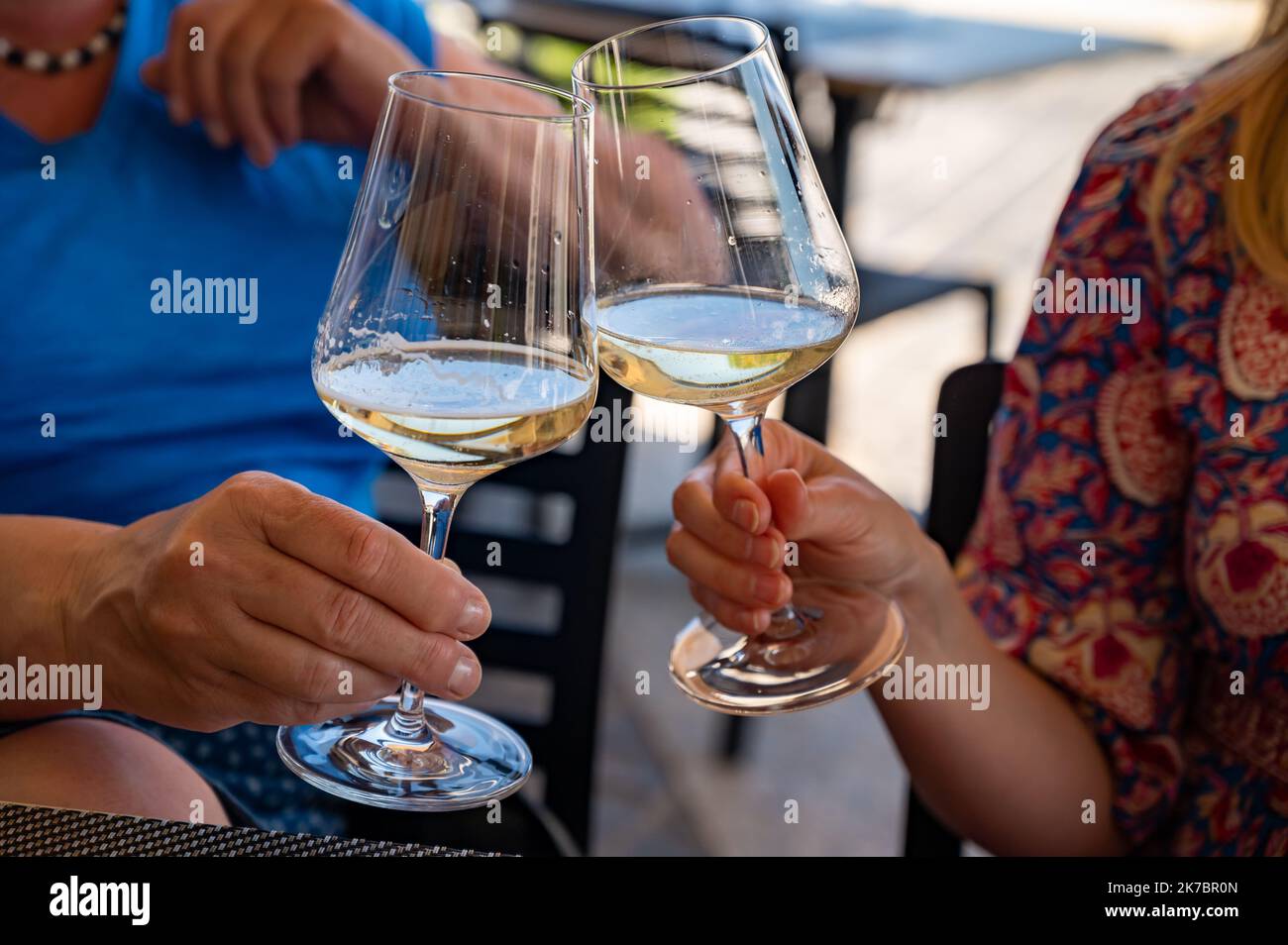 Drinking of txakoli or chacolí slightly sparkling very dry white wine