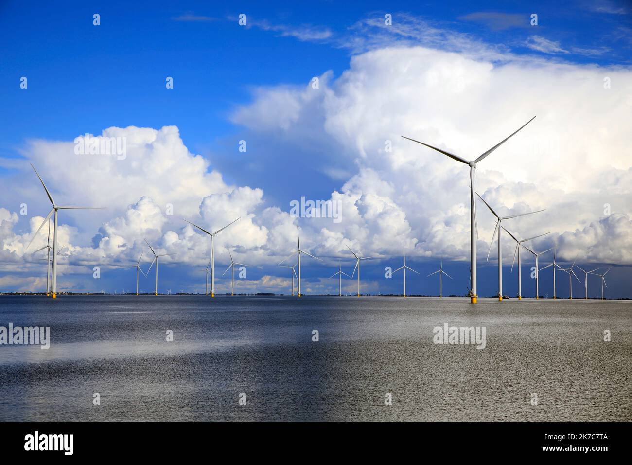 Beautiful cloudcape over wind-turbine in the Ijsselmeer, Holland Stock Photo