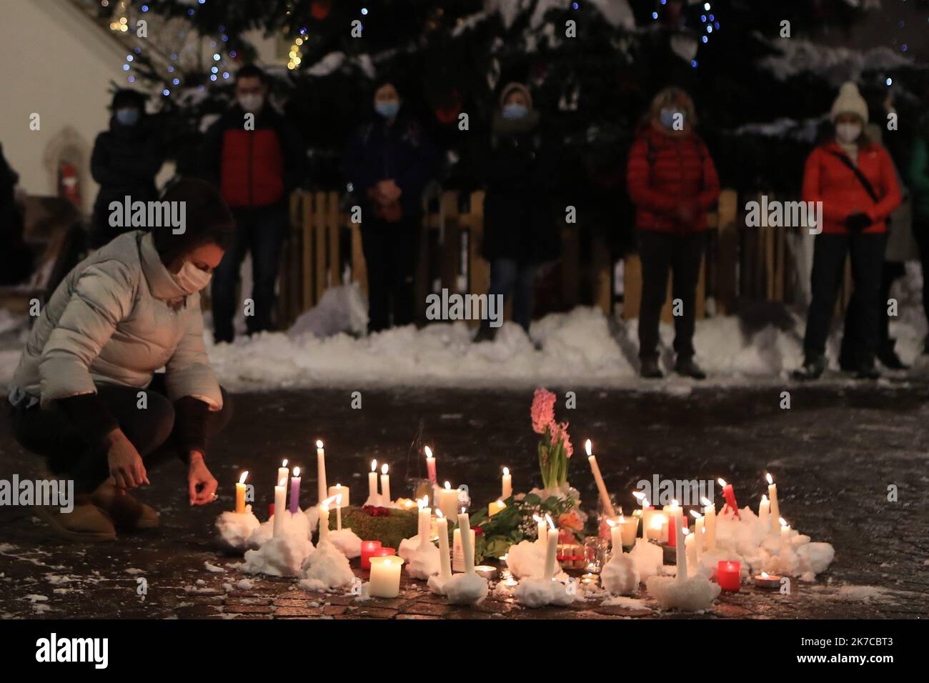 ©Pierre Teyssot/MAXPPP ; Death of Ethiopian Migrant Agitu Gudeta Ideo - La Capra Felice - Commemoration on 30/12/2020 in Pergine Valsugana, Italy. Agitu Idea Gudeta has built a thriving cheese business 'La Capra Felice' in Valle Dei Mocheni after migrating from Ethiopia she has been found dead at her home killed by one of her employee from Ghana. Local population under Coronavirus Pandemic meet before a curfew for a commemoration with candles in front of the City Hall. Â© Pierre Teyssot / Maxppp  Stock Photo