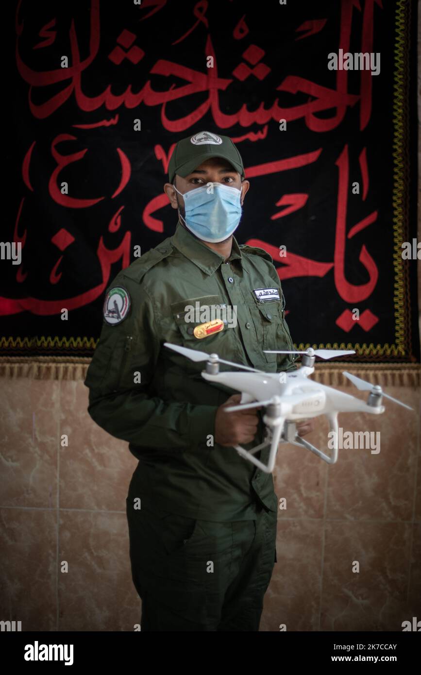 ©Chloe Sharrock / Le Pictorium/MAXPPP - Chloe Sharrock / Le Pictorium - 23/12/2020 - Irak / Samara - Militaires de la 43e brigade des Hachd Al-Chaabi dans le camp militaire de Samara en Irak. La brigade est composee de miliciens de Asaib Ahl al-Haq (AAH). A une semaine de la commemoration de l'assassinat des leaders Iraniens Qassem Soleimani et Al-Mohandis, un entrainement est organise a la base militaire de la Brigade 43 des Hachd al-Chaabi. La Brigade 43 est composee de paramilitaires du mouvement Asa'ib Ahl al-Haq. Samara, Irak. / 23/12/2020 - Iraq / Samara - Militiamen from the 43rd briga Stock Photo