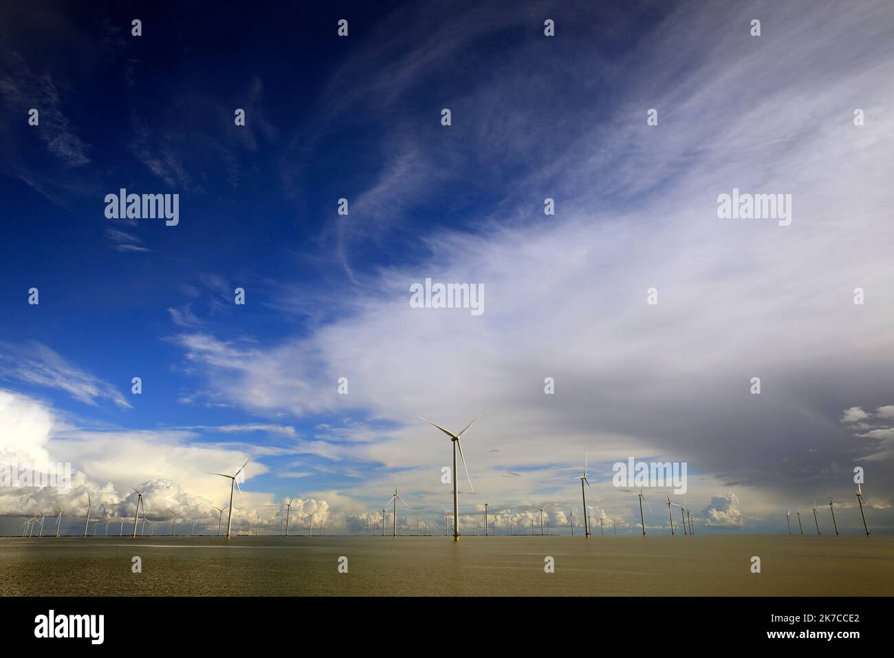Beautiful cloudcape over wind-turbine in the Ijsselmeer, Holland Stock Photo