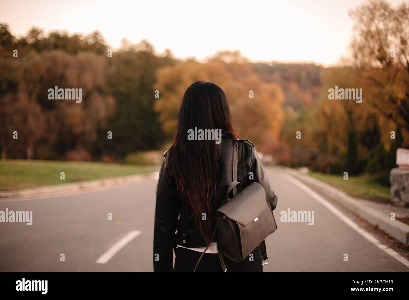 Woman Back With A Black Leather Jacket With Handmade Flower Motive  Decoration In The Forest On Spring Sunny Day Stock Photo - Download Image  Now - iStock