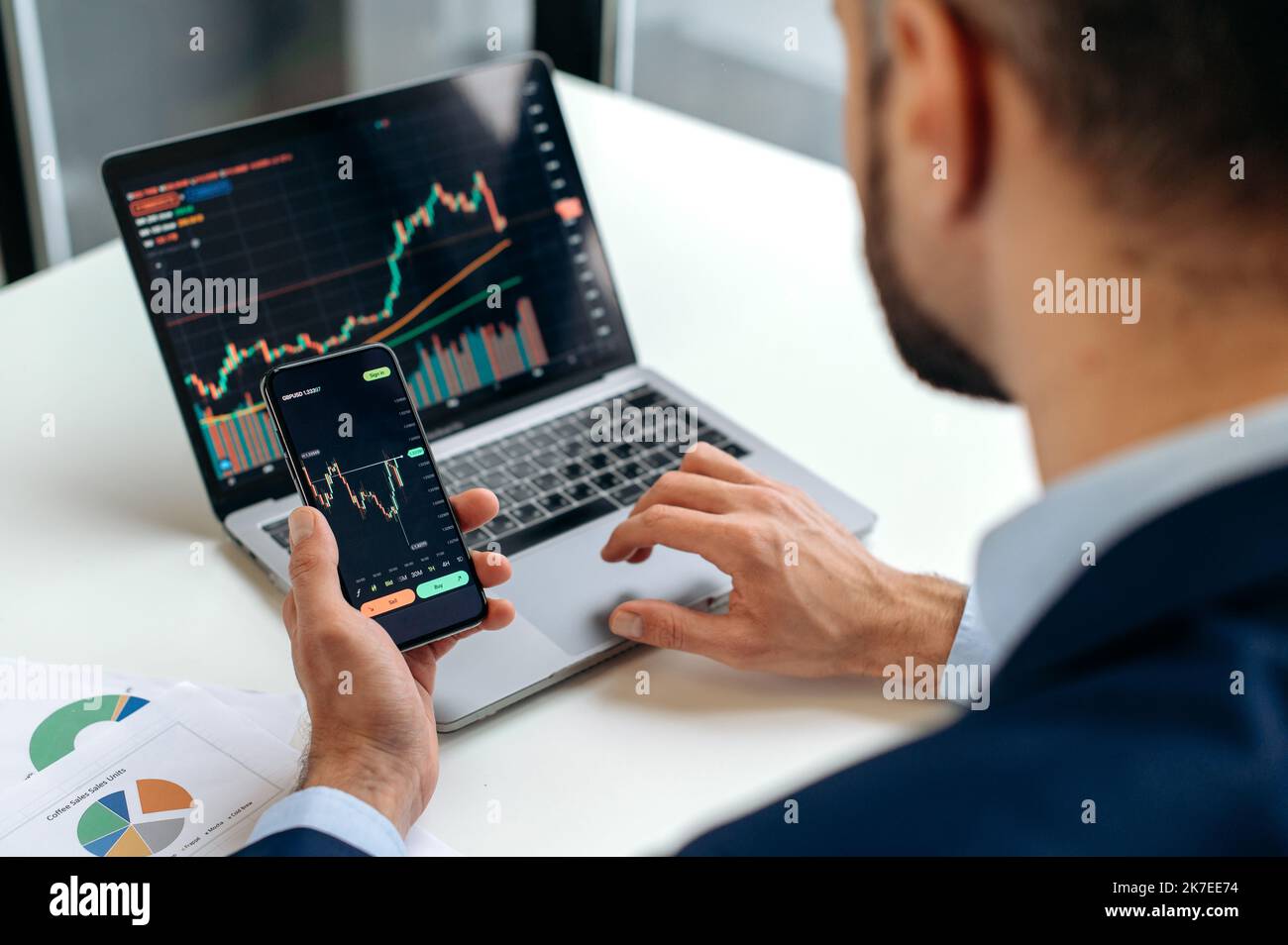 Men Trading Male trader using computer trade hi-res stock photography and images ...