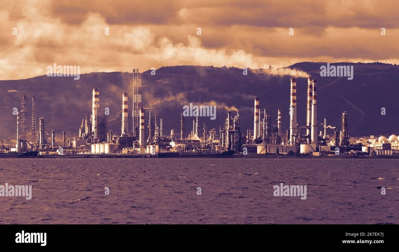 Oil refinery plant. Petrochemical industrial factory. Oil and gas refinery area. Pipelines plant and Oil tank background. Stock Photo