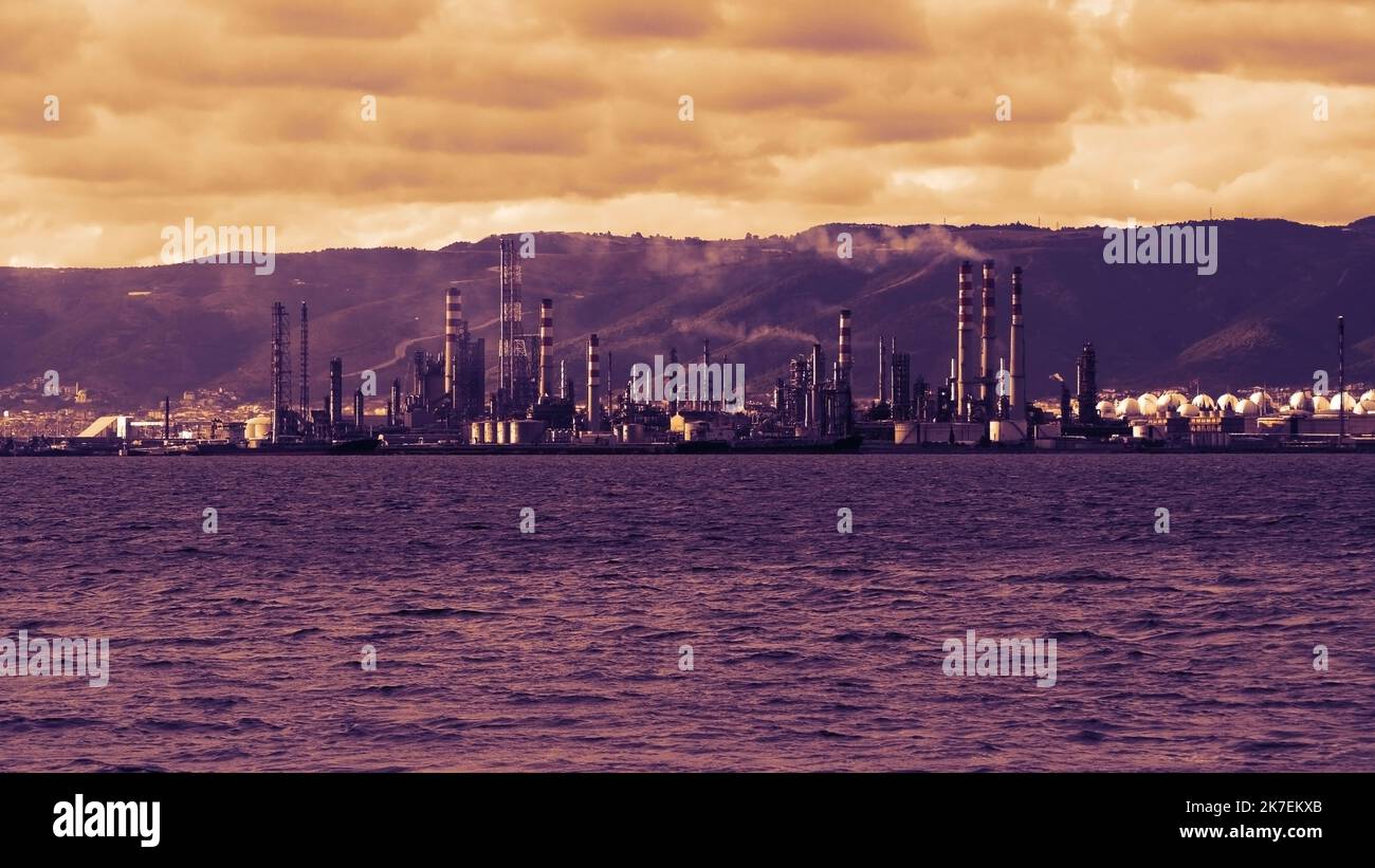 Oil refinery plant. Petrochemical industrial factory. Oil and gas refinery area. Pipelines plant and Oil tank background. Stock Photo