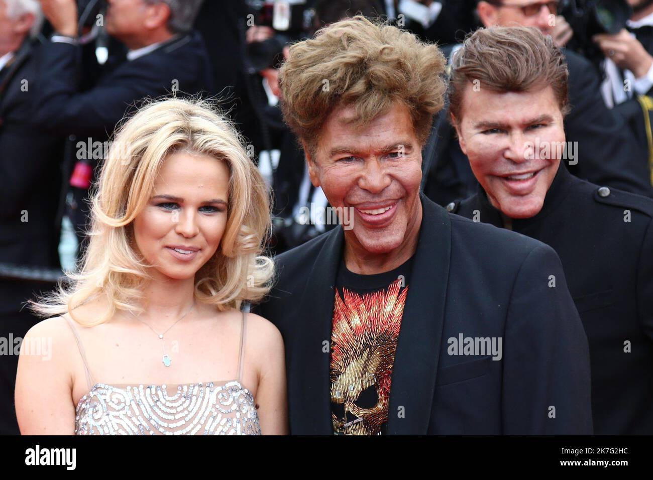 ©Pierre Teyssot/MAXPPP ; FILE PICTURE - Cannes Film Festival 2018 - 71st edition - Day 8 - May 15 in Cannes, on May 15, 2018; Screening of 'Solo: A star Wars Story; Grichka Bogdanoff is died on the 28th of December 201, in Paris at the age of 72, probably from Covid-19. On the red carpet, posing for photographer, Julie Jardon, Grichka Bogdanoff (center) and left his brother Igor Bogdanoff. Â© Pierre Teyssot / Maxppp  Stock Photo