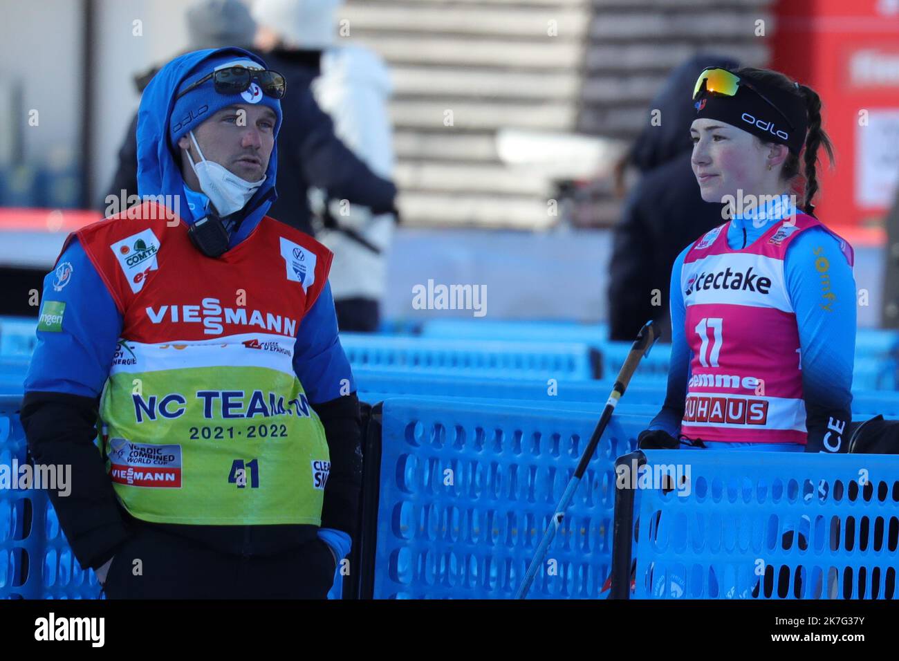 ©Pierre Teyssot/MAXPPP ; FIS Nordic Combined World Cup 2022 under Covid-19 Pandemic. Lago di Tesero, Val Di Fiemme, Italy on January 8, 2022. Lena Brocard (FRA) and her coach. Â© Pierre Teyssot / Maxppp  Stock Photo