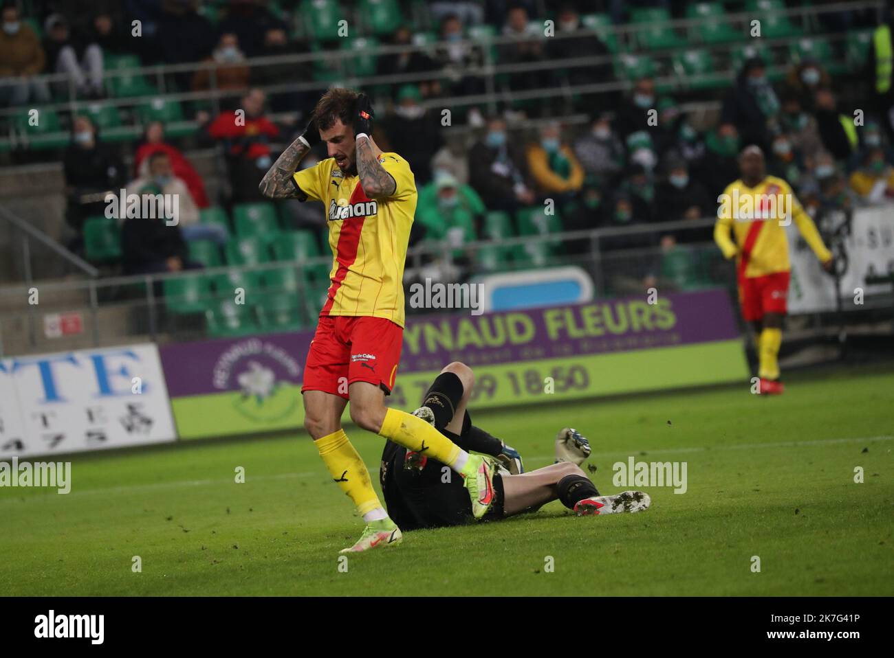 players of RC Lens and their president Joseph Oughourlian pictured  celebrating after winning and qualifying for the Champions League after a  soccer game between t Racing Club de Lens and AC Ajaccio