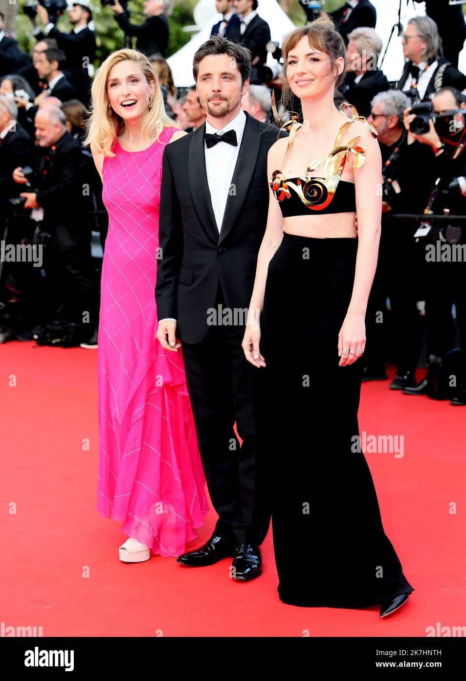 ©PHOTOPQR/NICE MATIN/Patrice Lapoirie ; Cannes ; 24/05/2022 ; From L) French actress Julie Gayet, Raphael Personnaz and French actress Louise Bourgoin arrive for the screening of the film 'The Innocent (L'Innocent)' during the 75th edition of the Cannes Film Festival in Cannes, southern France, on May 24, 2022. Stock Photo