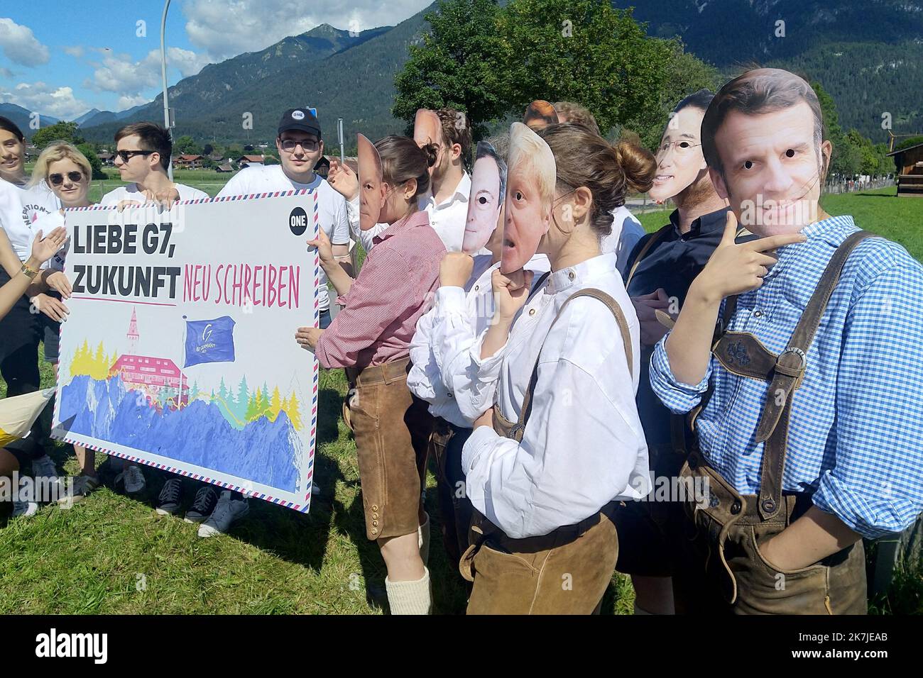 ©Pierre Teyssot/MAXPPP ; Activists from One (Bono) some wearing masks in the likeness of the leaders (Macron, Trudeau, Kishida, Johnson, Biden) of the G7 group of nations, demonstrate near the media centre prior to the G7 summit on June 25, 2022 in Garmisch-Partenkirchen, Germany. The G7 summit will run from June 26 till 28. . Â© Pierre Teyssot / Maxppp  Stock Photo