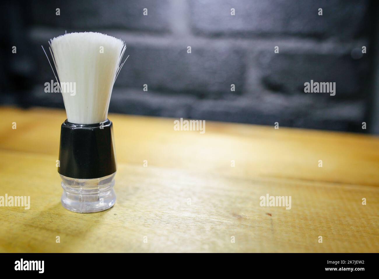 Classic shaving brush with raccoon fur (isolated on white Stock Photo