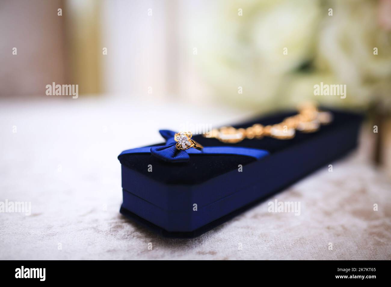 Close up of elegant diamond ring and selective focus.love and wedding concept. Stock Photo