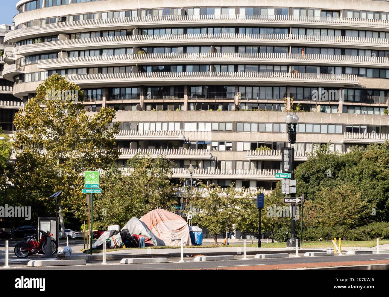 A large tent that is part of a multiple tent homeless encampment can be