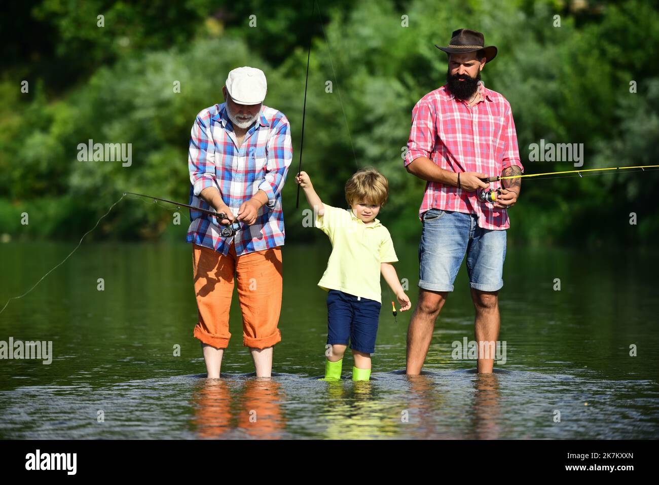 Anglers. Young - adult concept. Fishing. Father, son and grandfather ...