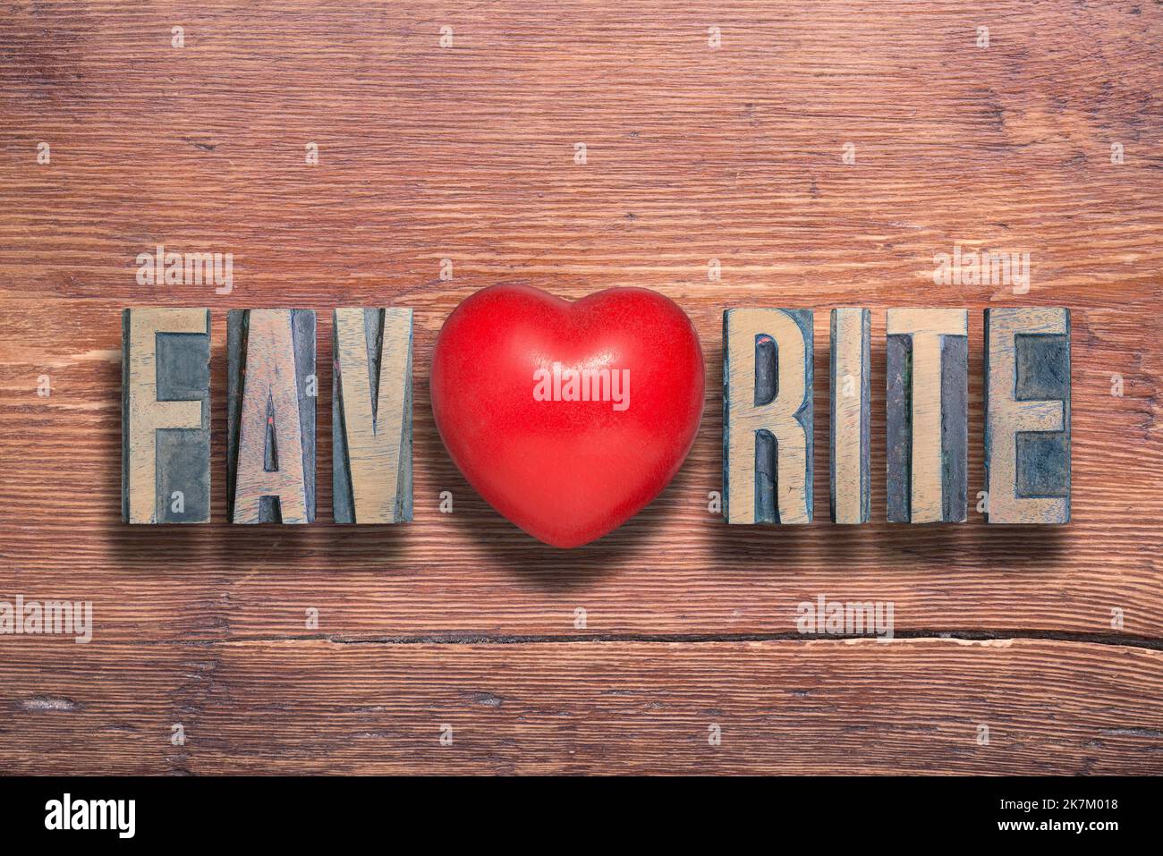 favorite word combined on vintage varnished wooden surface with heart symbol inside Stock Photo