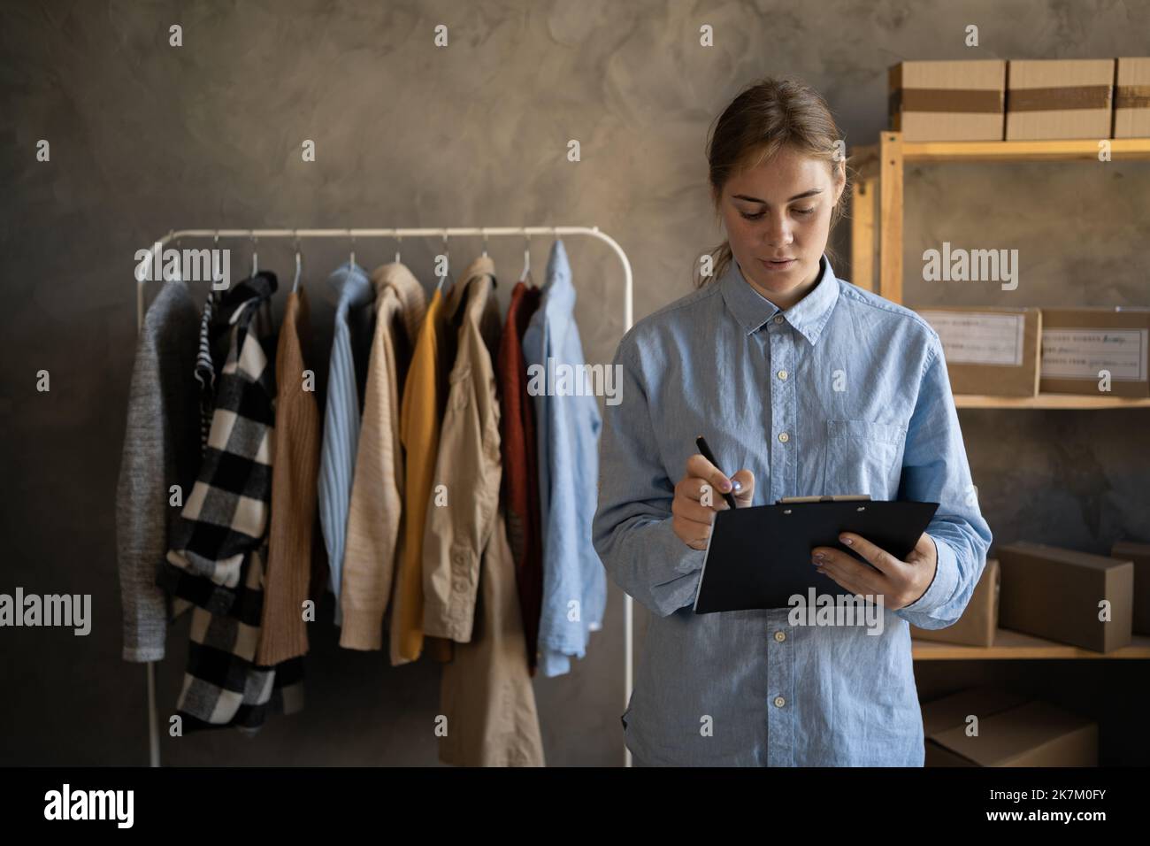 Startup small business entrepreneur SME, young woman selling clothes