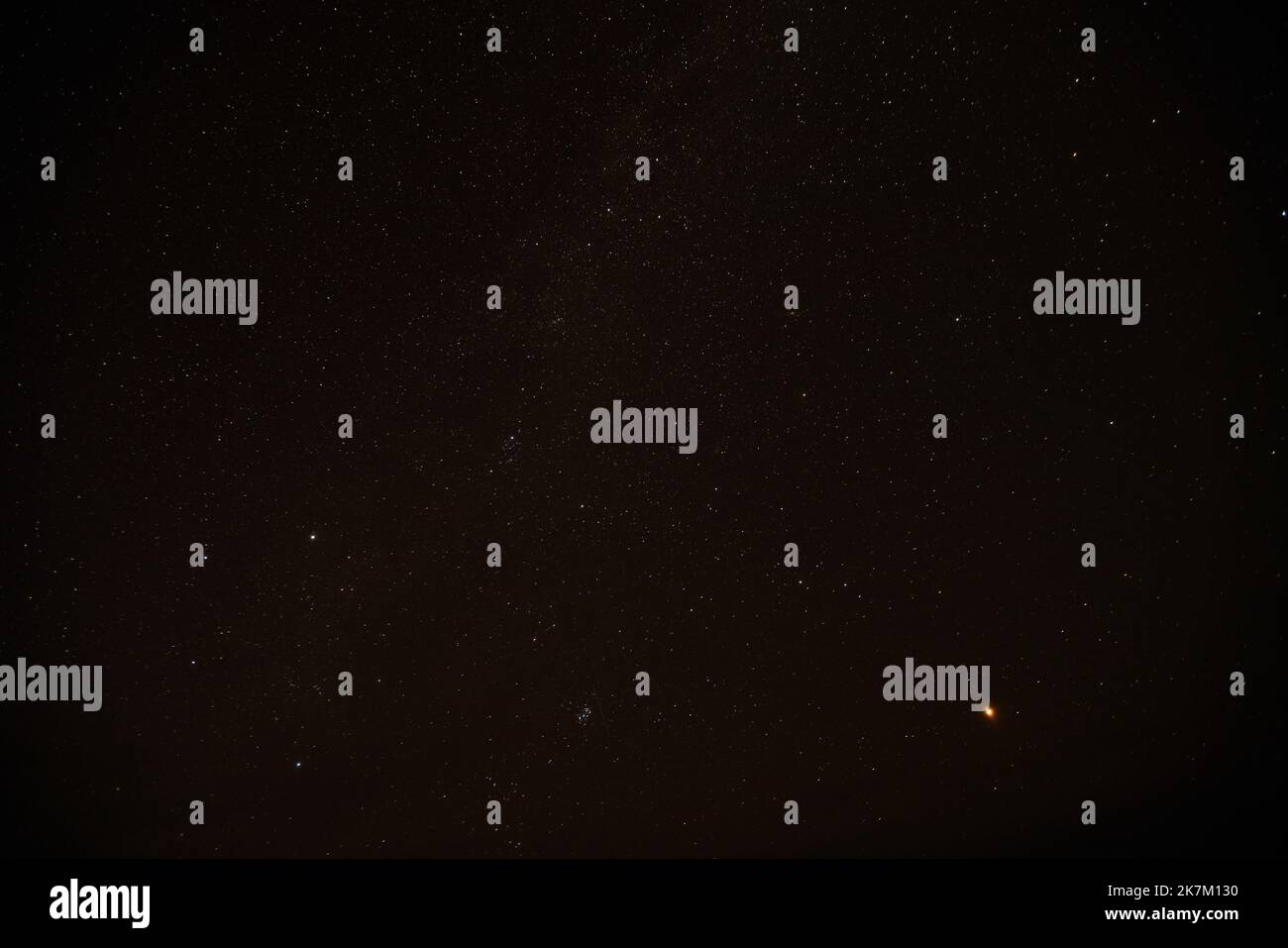 Dark night sky with stars above Arctic circle in autumn season