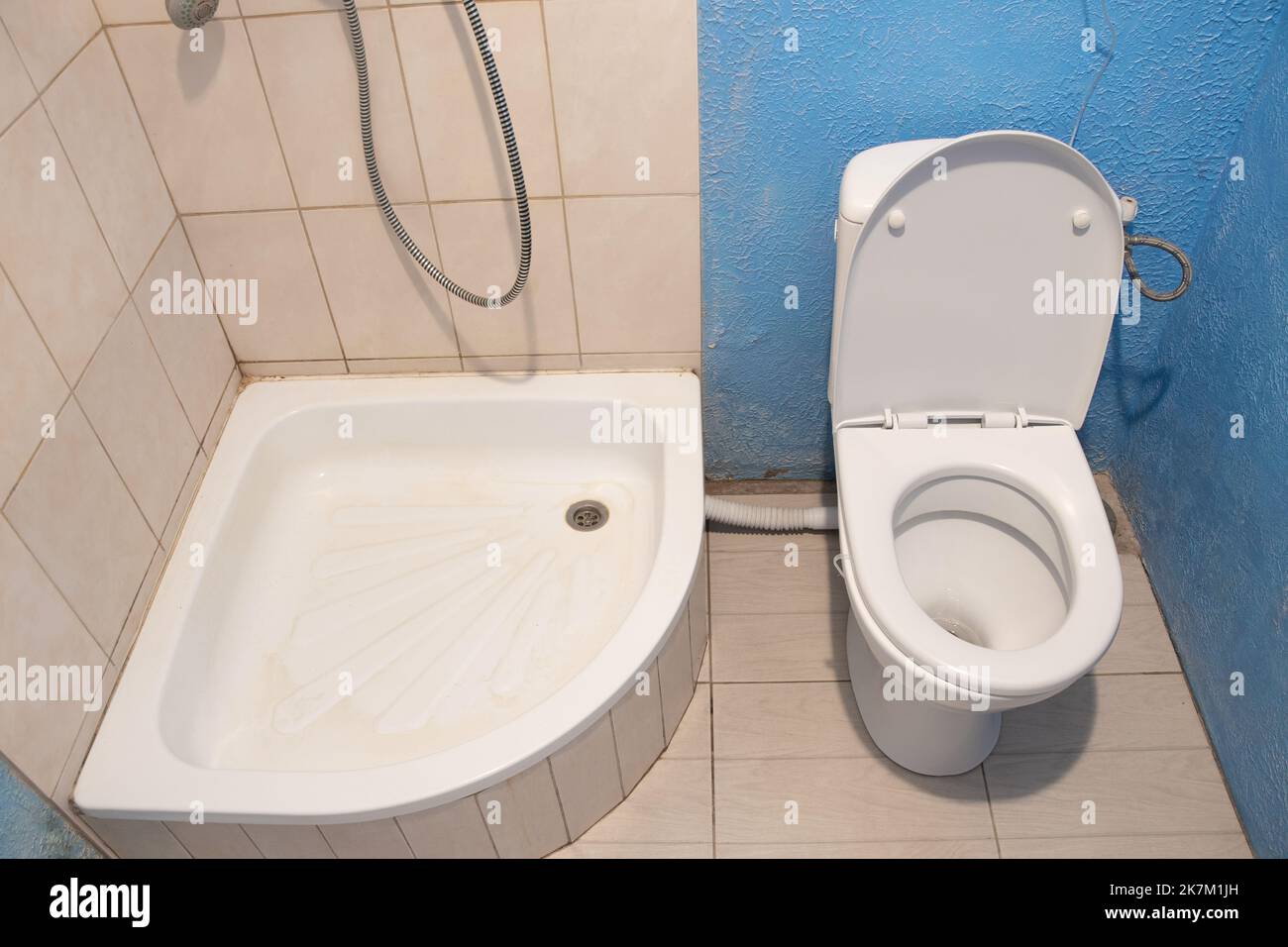 shower and toilet in a small bathroom, bathroom in the apartment