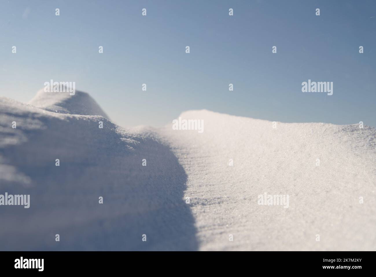 Snow drifts in the sunlight Stock Photo - Alamy