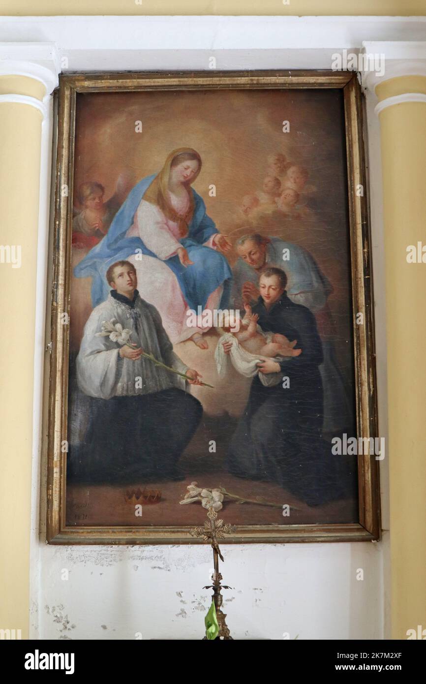 Praiano - Dipinto ottocentesco della Madonna con Bambino e Santi nella Chiesa di San Luca Stock Photo