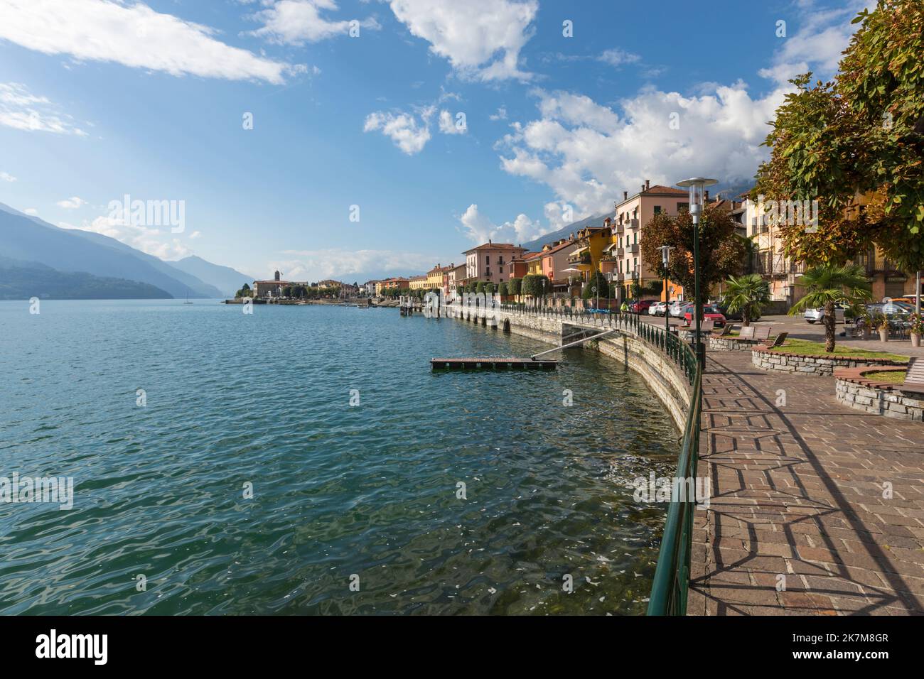 Boardwalk of Gravedona ed Uniti and Lake Como on a sunny late summer day Stock Photo
