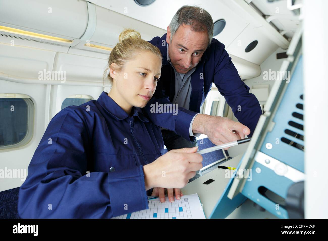 Engineer Inside engineers inside of the plane Stock Photo - Alamy
