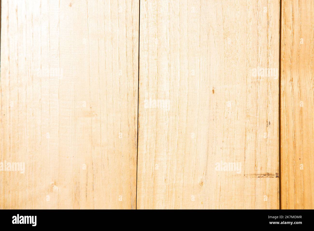 fresh light yellow pine board background. Natural ecological wallpaper. Building materials for wall decoration. Light varnished parquet board Stock Photo