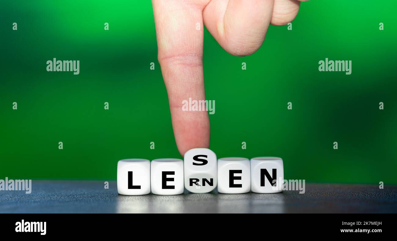 Dice form the German words 'lesen' and 'lernen' (learn to read). Stock Photo