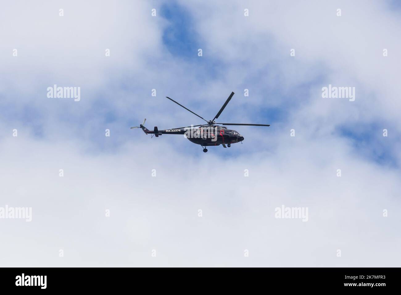 Neryungri, Yakutia, Russia. June 5, 2022.  Helicopter Mi-8 of the Rostec company in flight. Stock Photo