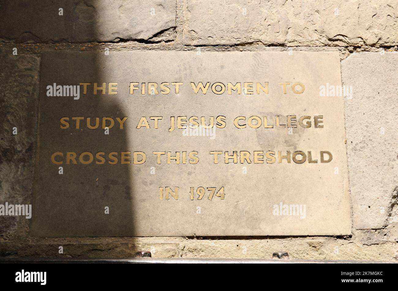 Flagstone commemorating the first admission of women to study at Jesus College in 1974 at the entrance in Turl Street, Oxford University, England, UK Stock Photo