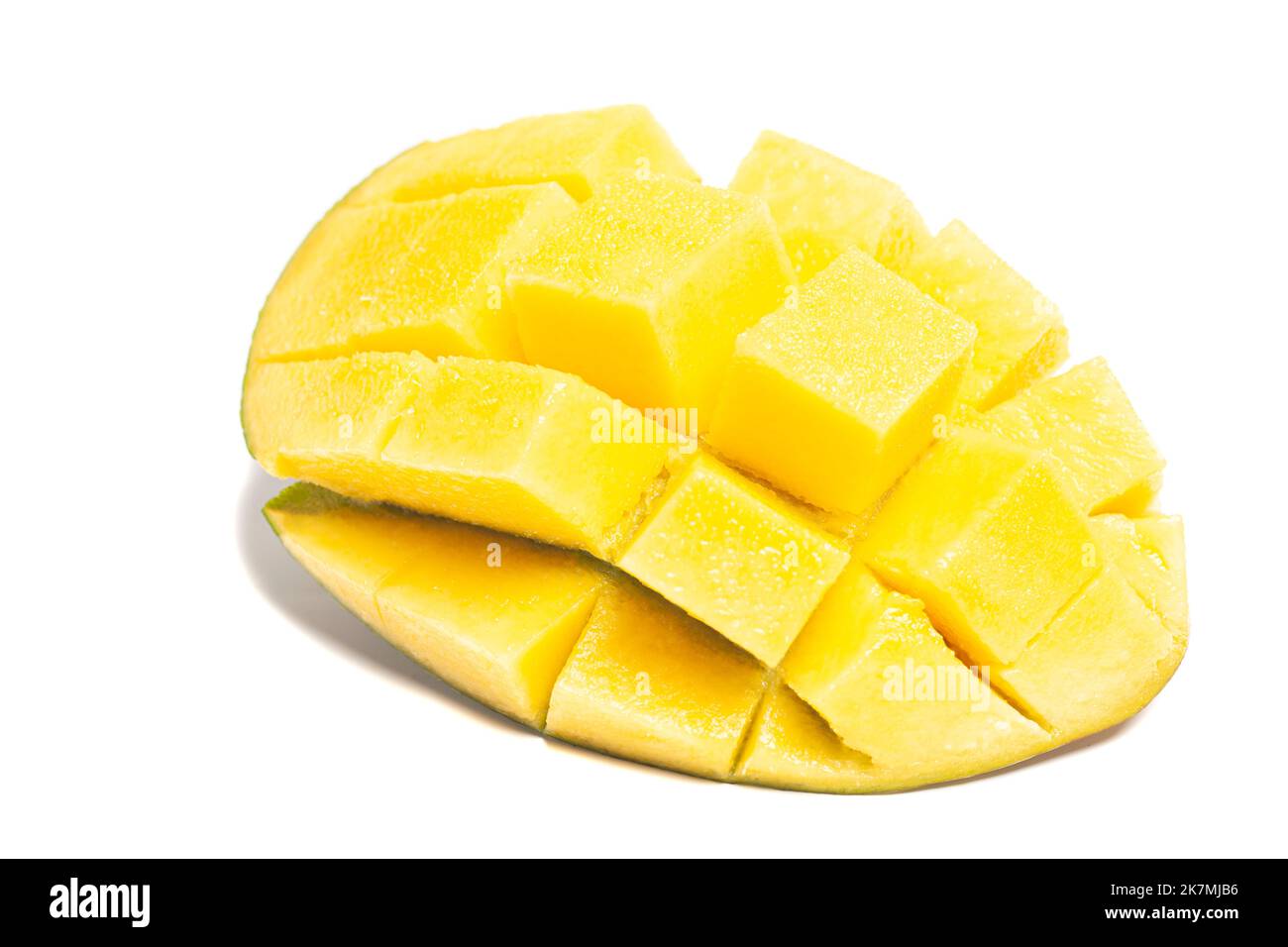 chopped half of ripe mango fruit isolated on white background Stock ...