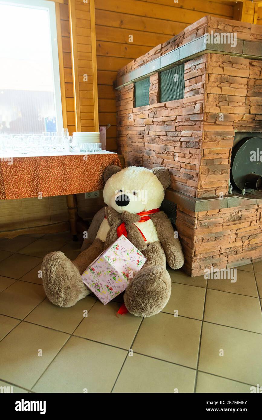 a sad teddy bear teddy bear lying in the corner Stock Photo