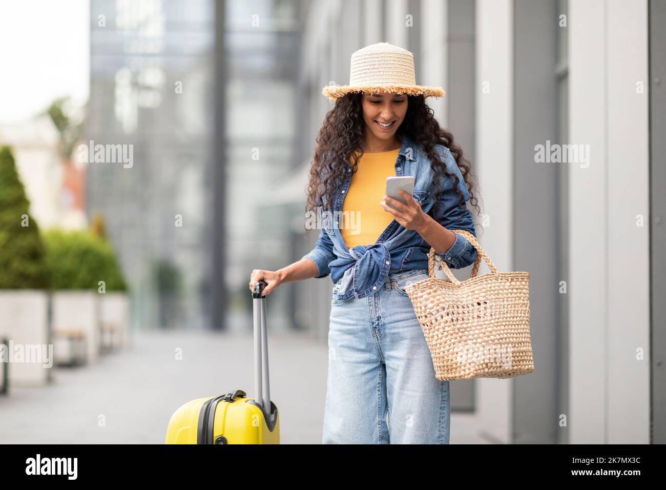 Woman hand luggage airport hi-res stock photography and images - Alamy