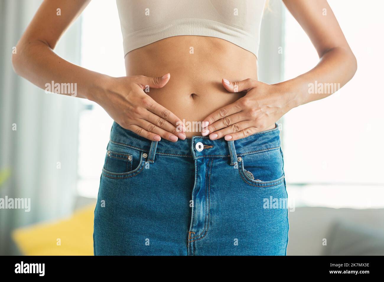Unrecognizable Slim Lady Touching Stomach Framing Belly Standing