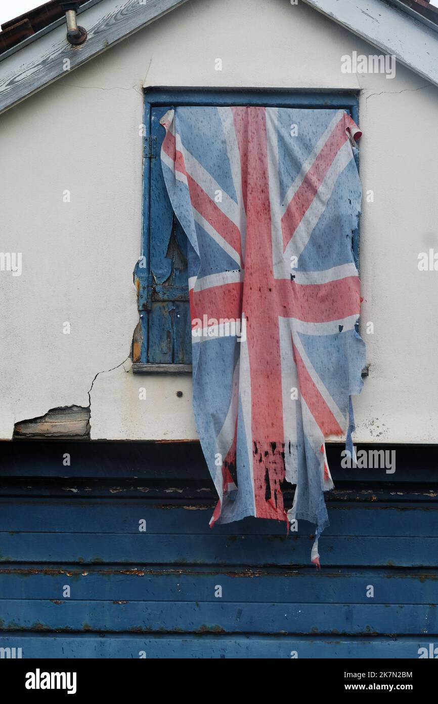 A battered union jack flag Stock Photo