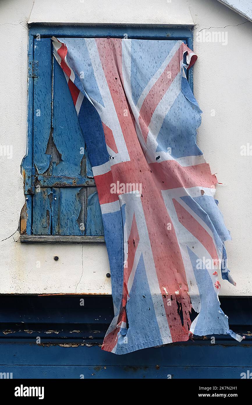 A battered union jack flag Stock Photo