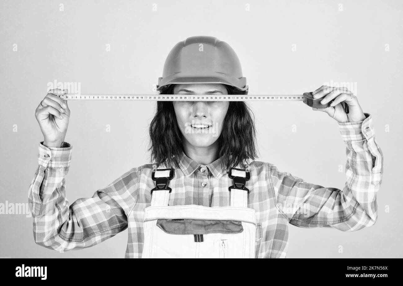 Female builder measure Black and White Stock Photos & Images - Alamy