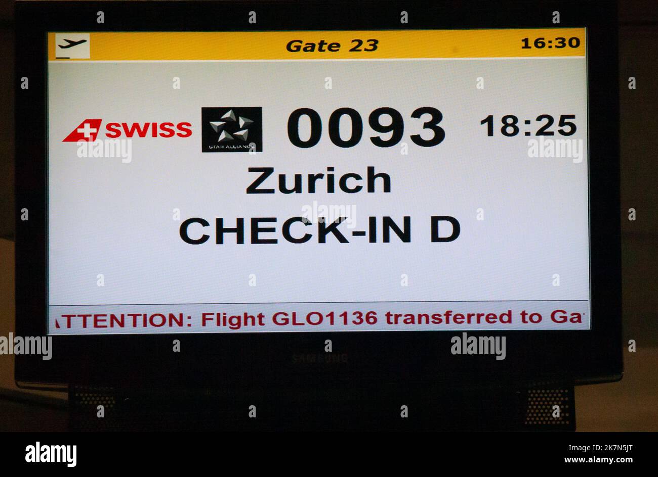 A boarding flight announcement sign in Zurich airport Stock Photo