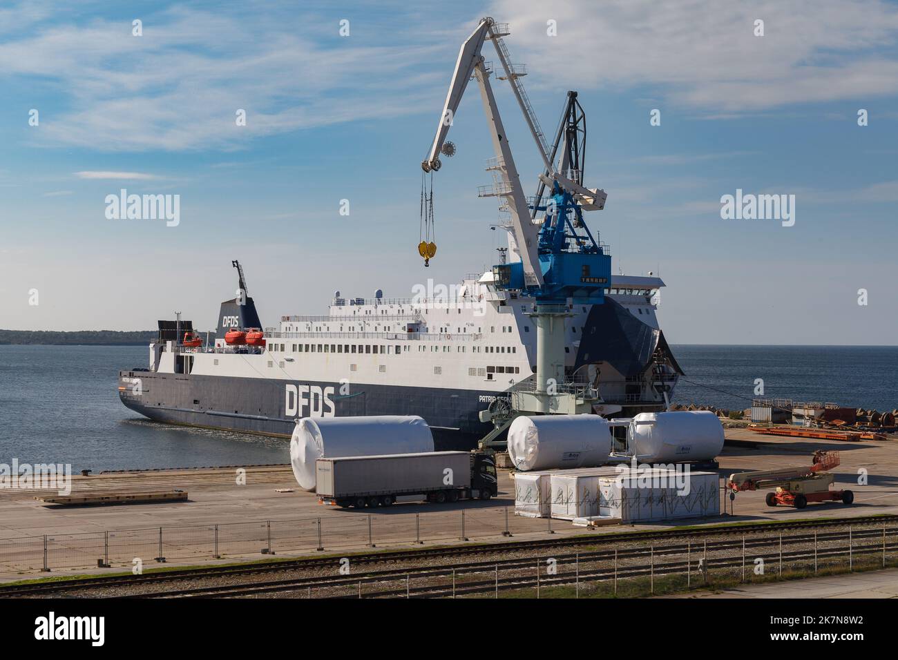 Lifting harbor cranes, shipping containers and granaries in the cargo ...