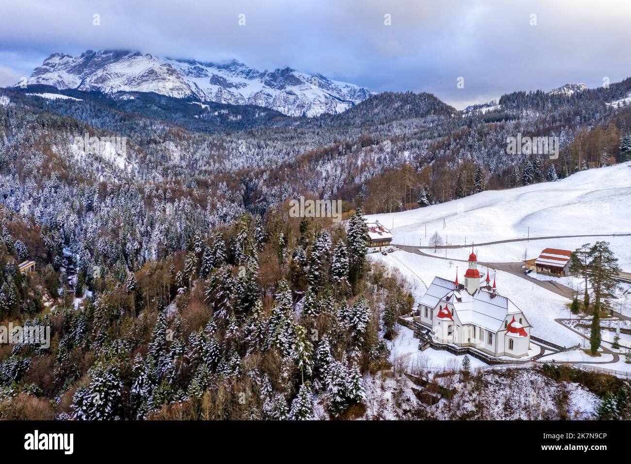 Hergiswald church, an important historical pilgrimage destination in Kriens, Switzerland, in the snow covered winter swiss Alps mountains Stock Photo