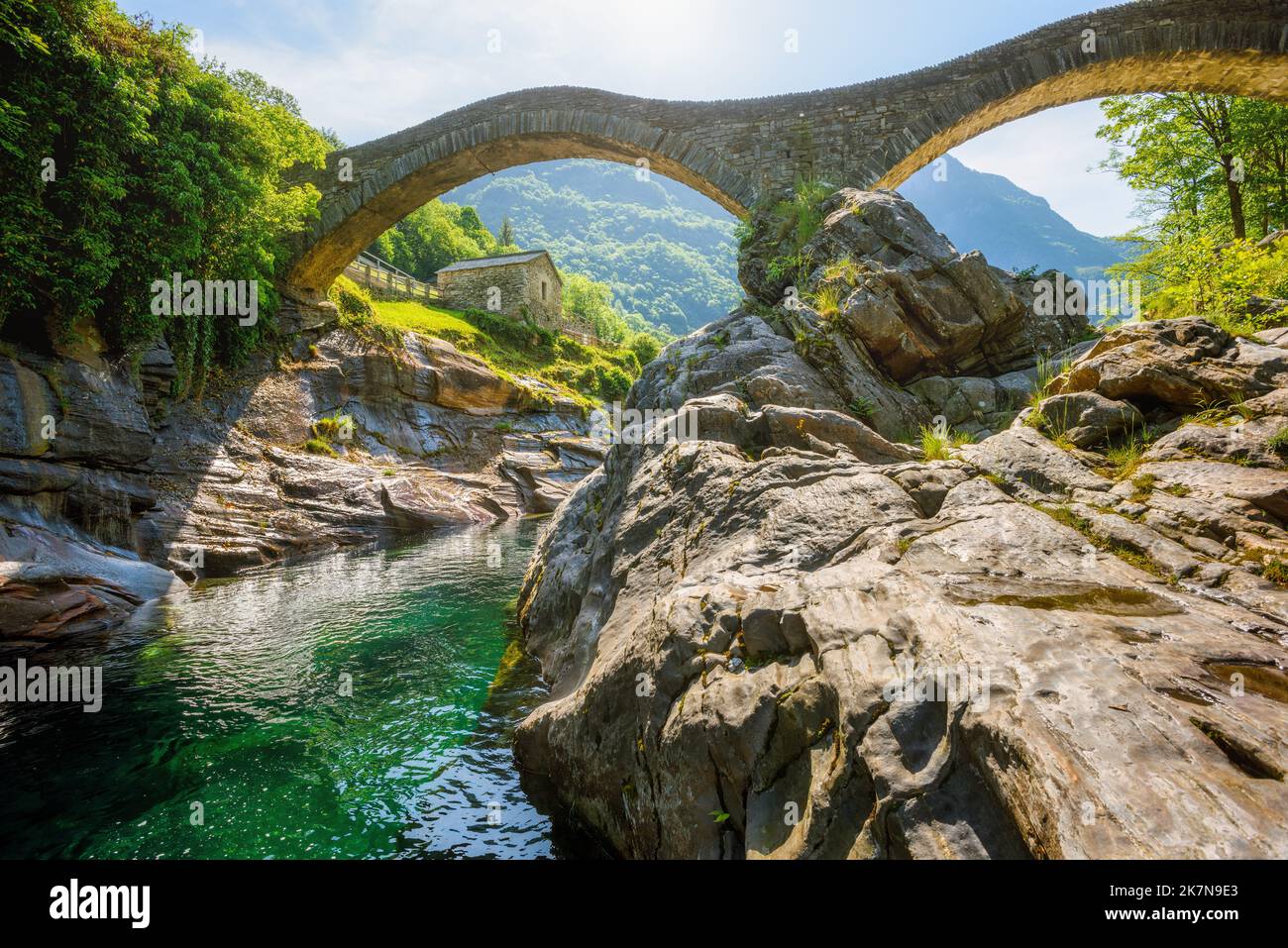 Romantic Ponte dei Salti bridge in Lavertezzo, Verzasca valley in swiss Alps mountains, Switzerland Stock Photo