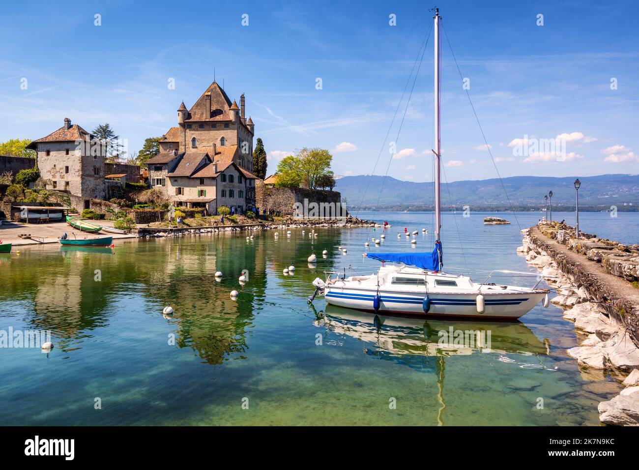 The castle and harbor of medieval Yvoire town on Lake Geneva, France. Yvoire is known as one of the most beautiful villages of France. Stock Photo