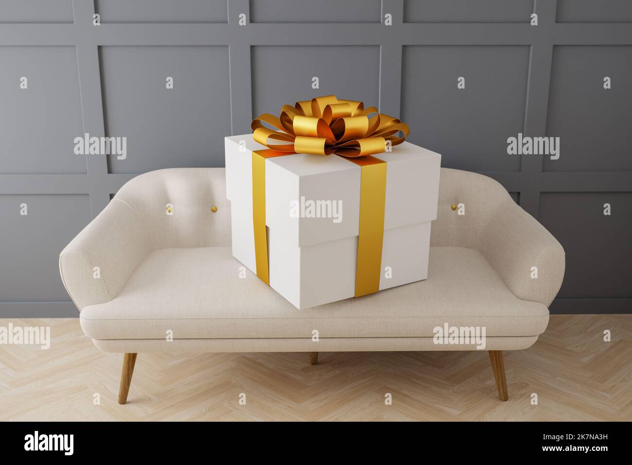 An oversized present box on a sofa. High angle view. Concept for excessive giving. Stock Photo