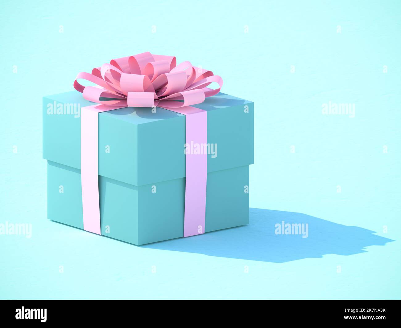 A turquoise green present box with pink ribbon on a turquoise green background with hard drop shadow. Orthographic view Stock Photo