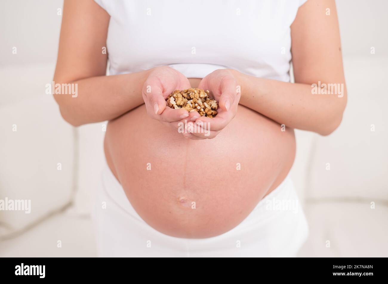Pregnant eating nuts hires stock photography and images Alamy