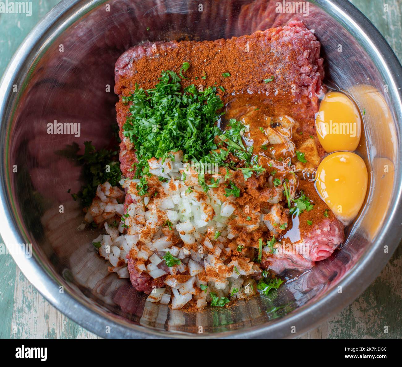 Meatball dough in a bowl Stock Photo