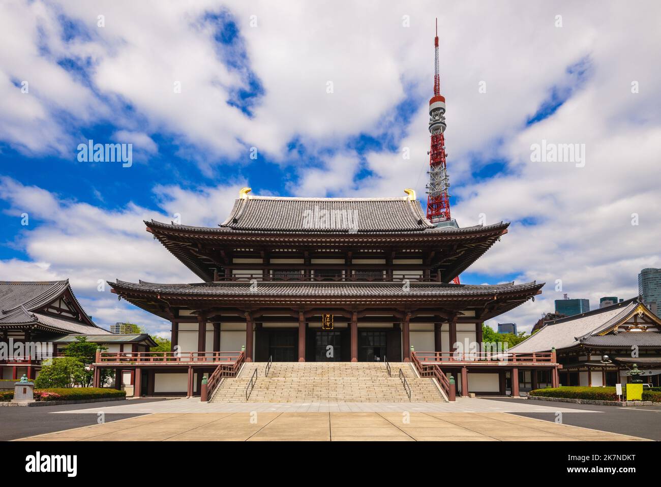main hall of zojoji and tokyo tower in japan. Translation: Zojoji temple. Stock Photo